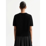 "Boucle" black sweater. Skirts