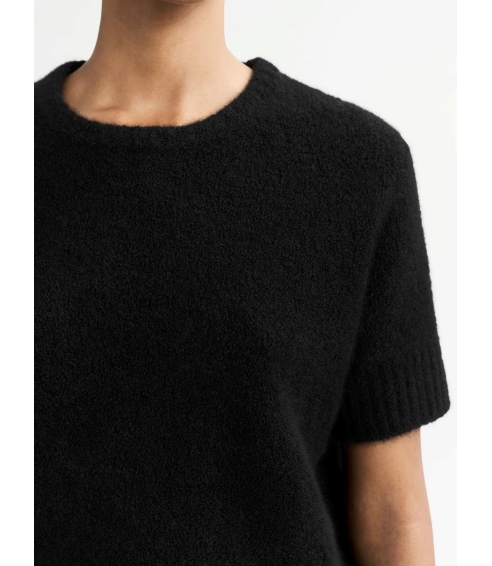 "Boucle" black sweater. Skirts
