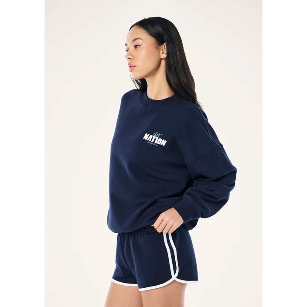 P.E Nation Džemperiai "Champion Oversized Sweat" mėlynos spalvos džemperis P.E Nation "Champion Oversized Sweat" mėlynos spalvos džemperis. Džemperiai