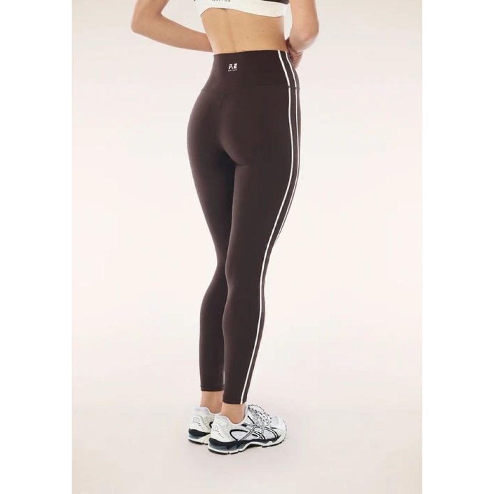 P.E Nation Tamprės "Clarity Full Length Legging" rudos spalvos tamprės P.E Nation "Clarity Full Length Legging" rudos spalvos tamprės. Tamprės