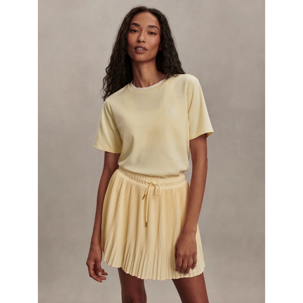 Varley Sijonai "Davina High-Rise Skort" gelsvos spalvos sijonšorčiai Varley "Davina High-Rise Skort" gelsvos spalvos sijonšorčiai. Sijonai