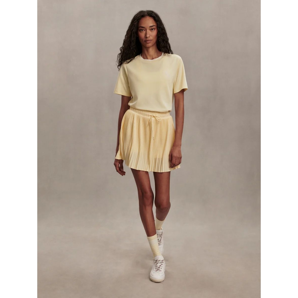 Varley Sijonai "Davina High-Rise Skort" gelsvos spalvos sijonšorčiai Varley "Davina High-Rise Skort" gelsvos spalvos sijonšorčiai. Sijonai