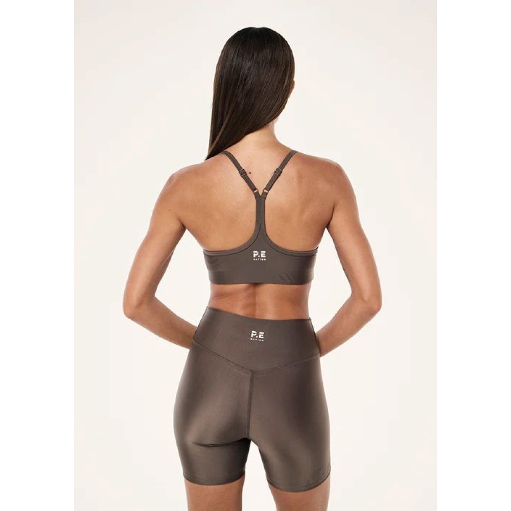 P.E Nation "Fairmont Sports Bra" blizgios rudos spalvos sportinė liemenėlė. Sportinės liemenėlės