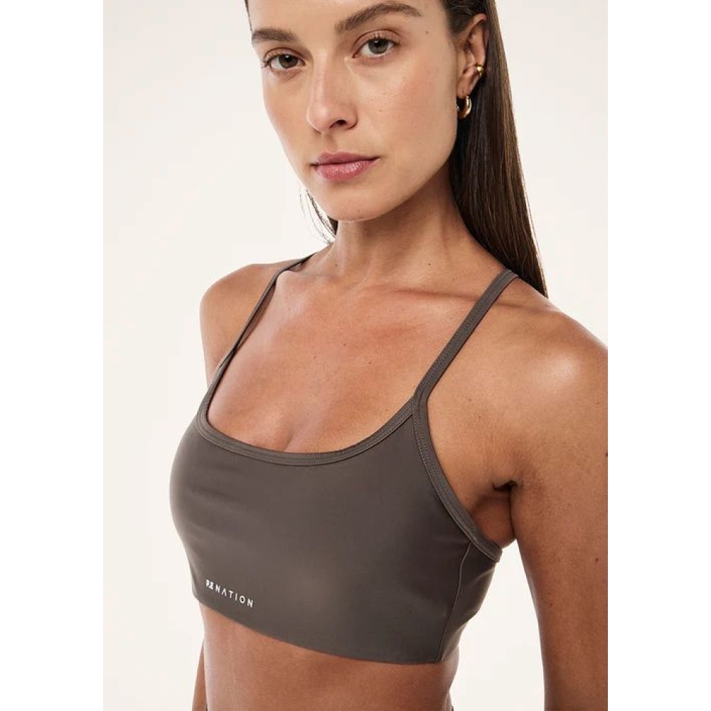 P.E Nation "Fairmont Sports Bra" blizgios rudos spalvos sportinė liemenėlė. Sportinės liemenėlės