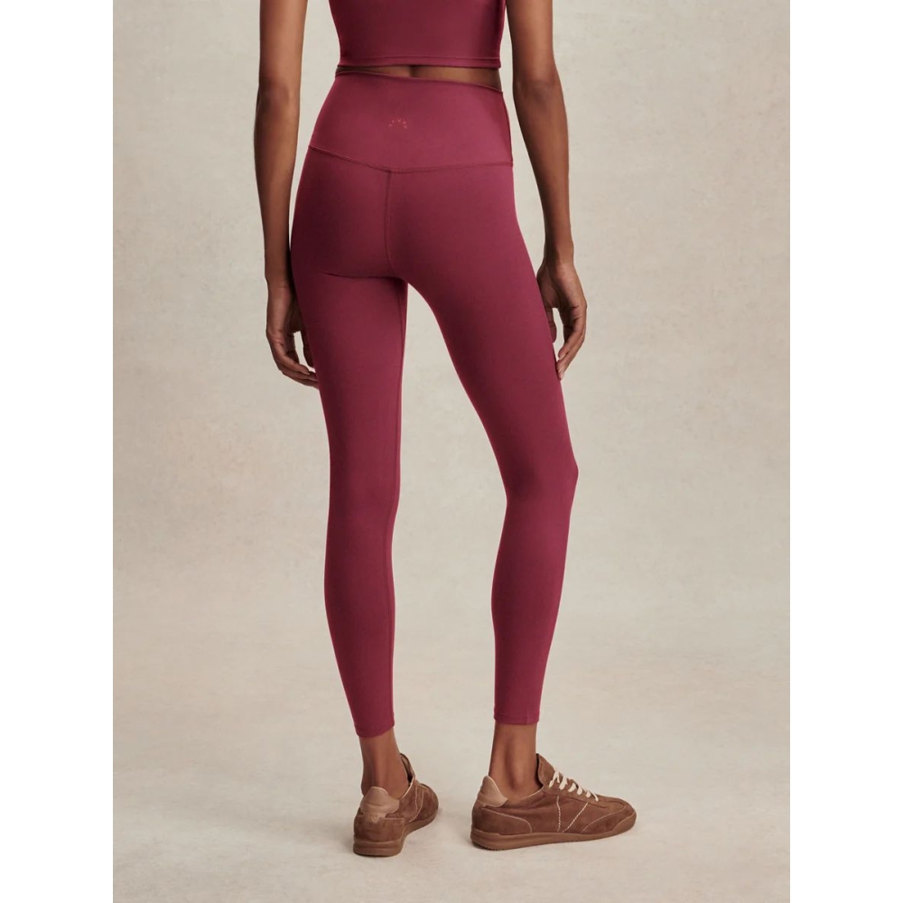 Varley "FreeSoft™ High-Rise Legging 25" tamsiai rausvos spalvos tamprės. Tamprės
