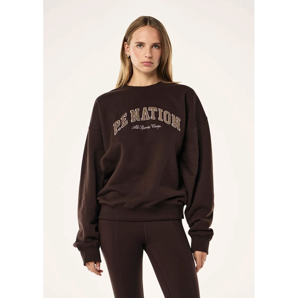 P.E Nation Džemperiai "Heritage Sweat" espresso spalvos džemperis P.E Nation "Heritage Sweat" espresso spalvos džemperis. Džemperiai