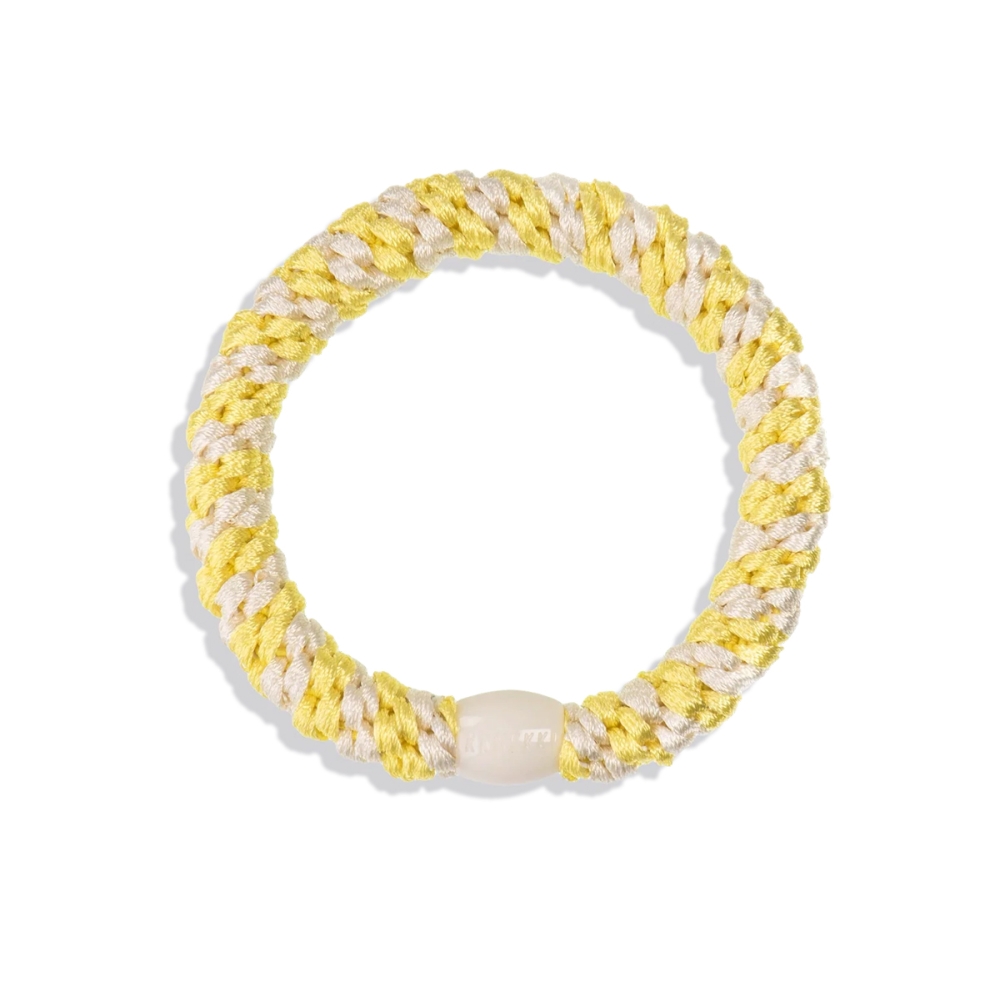 KKNEKKI Plaukų aksesuarai "Kknekki Lemon Ivory Stripe" plaukų gumelė KKNEKKI "Kknekki Lemon Ivory Stripe" plaukų gumelė. Plaukų aksesuarai