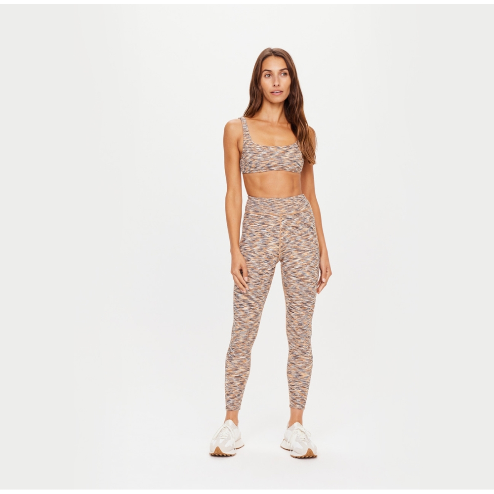 NIKA REVERSIBLE 25IN MIDI PANT. Leggings