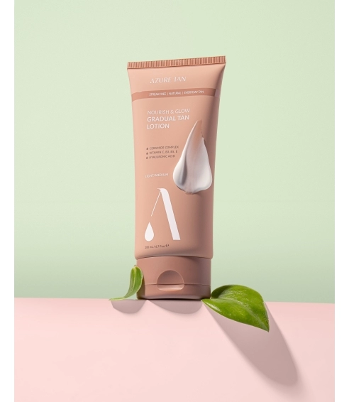 NOURISH AND GLOW GRADUAL TAN LOTION - LIGHT/MEDIUM. Body