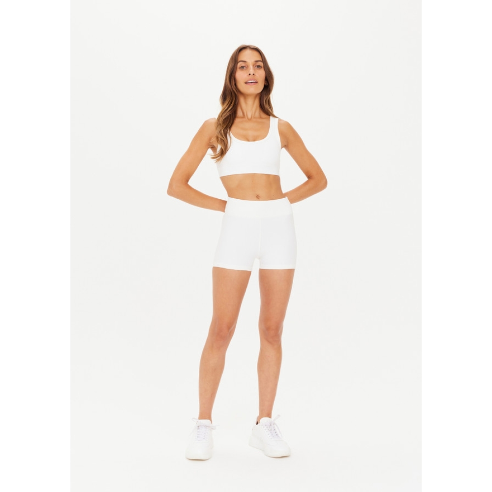 The Upside "Peached Harley Bra" baltos spalvos sportinė liemenėlė. Sportinės liemenėlės