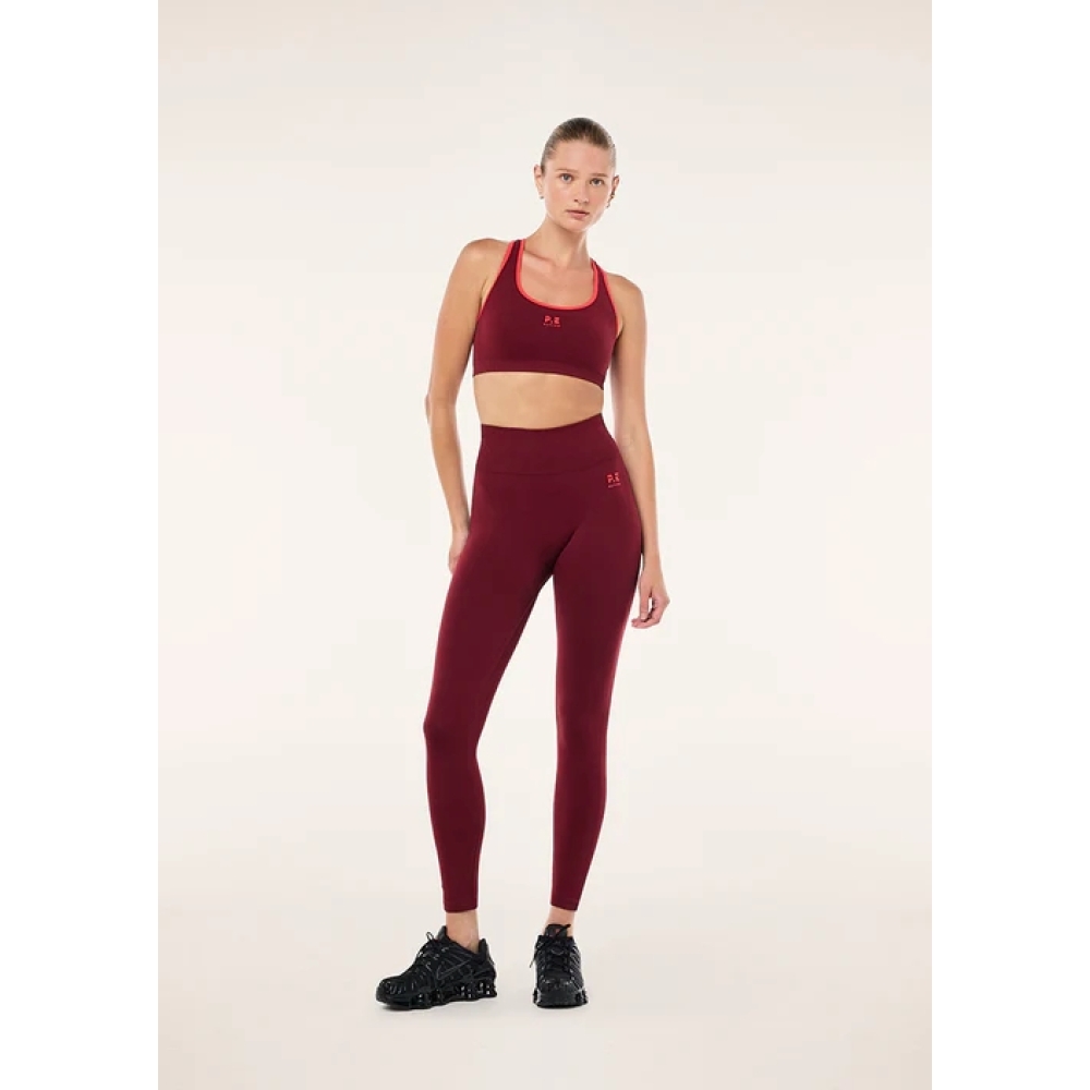 P.E Nation "Restore Seamless Legging" bordo spalvos besiulės tamprės. Tamprės