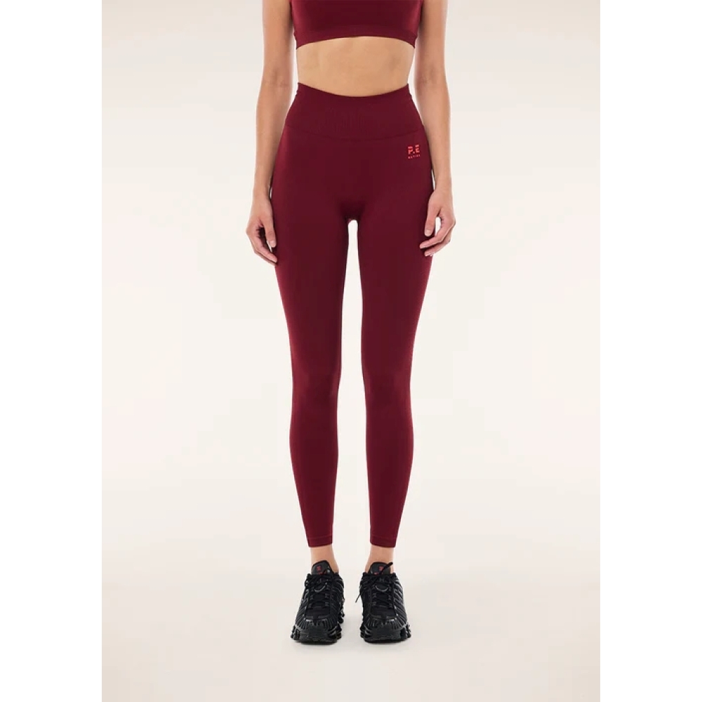 P.E Nation "Restore Seamless Legging" bordo spalvos besiulės tamprės. Tamprės