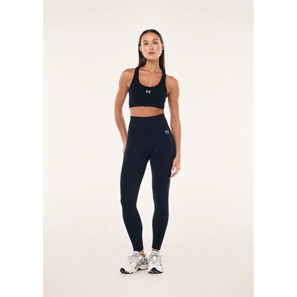 P.E Nation "Restore Seamless Legging" juodos spalvos besiulės tamprės. Tamprės