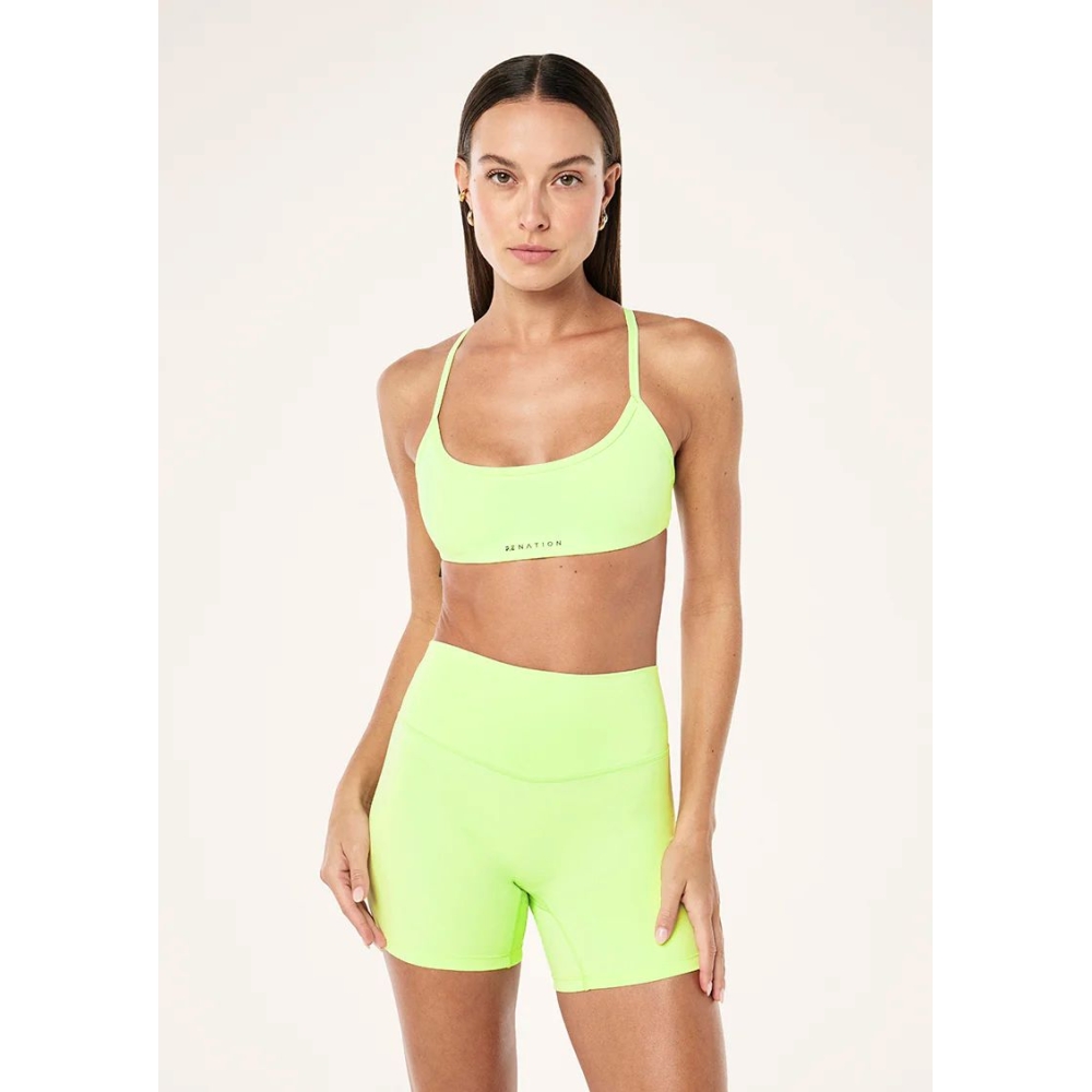 P.E Nation "Reveal Sports Bra" neoninės žalios spalvos sportinė liemenėlė. Sportinės liemenėlės