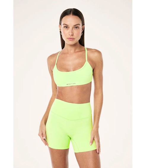"Reveal Sports Bra" neoninės žalios spalvos sportinė liemenėlė. Sportinės liemenėlės
