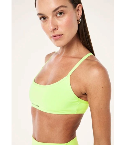 "Reveal Sports Bra" neoninės žalios spalvos sportinė liemenėlė. Sportinės liemenėlės